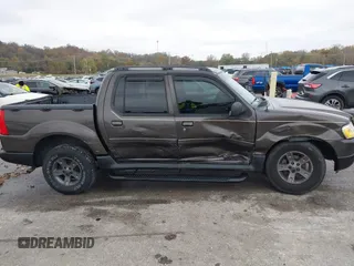 2005 Ford Explorer Sport Trac XLS z VIN 1FMZU77K05UB13891, wystawiony jako IAAI lot #40859877 z przebiegiem 157 308 mil mil oraz . Historia ofert i sprzedaży dostępna na DreamBid. Obrazek 13.