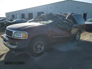 1997 Ford Expedition XLT z VIN 1FMEU1760VLC30455, wystawiony jako Copart lot #78325314 z przebiegiem Nie podano mil oraz Szkoda całkowita • Salvage title. Historia ofert i sprzedaży dostępna na DreamBid. Obrazek 1.