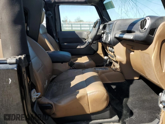 2012 Jeep Wrangler Sahara z VIN 1C4AJWBG1CL216425, wystawiony jako Copart lot #48377825 z przebiegiem 99 649 mil mil oraz Szkoda całkowita • Salvage title. Historia ofert i sprzedaży dostępna na DreamBid. Obrazek 10.