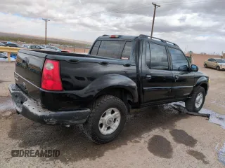 2001 Ford Explorer Sport Trac z VIN 1FMZU77E81UC59699, wystawiony jako Copart lot #50420055 z przebiegiem 236 138 mil mil oraz Szkoda całkowita • Salvage title. Historia ofert i sprzedaży dostępna na DreamBid. Obrazek 3.