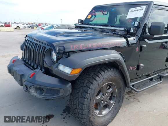 2021 Jeep Gladiator Rubicon z VIN 1C6JJTBG6ML535939, wystawiony jako IAAI lot #42260764 z przebiegiem 114 060 mil mil oraz . Historia ofert i sprzedaży dostępna na DreamBid. Obrazek 18.