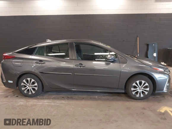 2021 Toyota Prius LE with VIN JTDKAMFP8M3175487, listed as a IAAI auction lot 42176936 with 78,153 mi miles and . Bid and sale history available at DreamBid. Image 13.