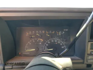 1994 GMC Suburban z VIN 1GKFK16K0RJ751324, wystawiony jako Copart lot #77827404 z przebiegiem 219 786 mil mil oraz Szkoda całkowita • Salvage title. Historia ofert i sprzedaży dostępna na DreamBid. Obrazek 9.