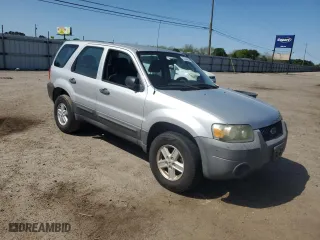 2007 Ford Escape XLS with VIN 1FMYU02Z77KB19323, listed as a Copart auction lot 52345655 with 153,509 mi miles and Salvage Title. Bid and sale history available at carsss.com. Image 4.