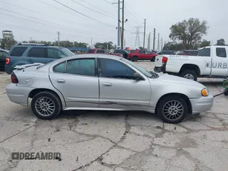 2005 Pontiac Grand Am SE with VIN 1G2NE52F75M255951, listed as a IAAI auction lot 41418328 with 199,700 mi miles. Bid and sale history available at carsss.com. Image 13.