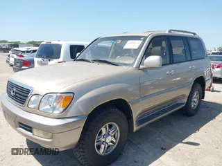 2001 Lexus LX 470 with VIN JTJHT00W613510736, listed as a IAAI auction lot 42005639 with 274,227 mi miles and . Bid and sale history available at carsss.com. Image 6.