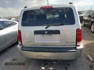 2009 Dodge Nitro SE z VIN 1D8GT28K29W504908, wystawiony jako Copart lot #75272154 z przebiegiem 156 571 mil mil oraz Szkoda całkowita • Salvage title. Historia ofert i sprzedaży dostępna na DreamBid. Obrazek 6.