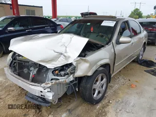 2000 Nissan Maxima GXE z VIN JN1CA31D8YT744603, wystawiony jako IAAI lot #42435490 z przebiegiem Nie podano mil oraz . Historia ofert i sprzedaży dostępna na DreamBid. Obrazek 2.