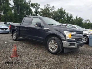 2020 Ford F-150 XL with VIN 1FTEW1C50LKD77986, listed as a Copart auction lot 61247745 with 140,855 mi miles and Salvage title. Bid and sale history available at DreamBid. Image 4.