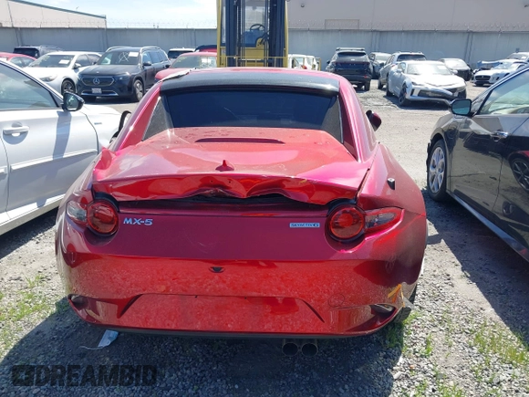 2021 Mazda MX-5 Miata Grand Touring с VIN JM1NDAM71M0459437, выставлен на аукционе IAAI как лот 41808704 с пробегом 19 368 миль миль и . История ставок и продаж доступна на DreamBid. Изображение 17.