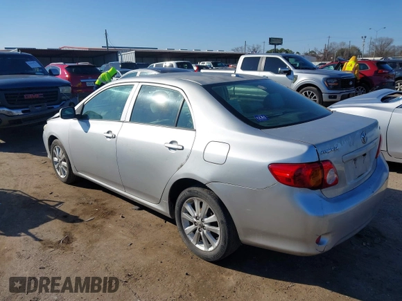 2009 Toyota Corolla with VIN JTDBL40E999021621, listed as a IAAI auction lot 41636462 with 123,650 mi miles. Bid and sale history available at carsss.com. Image 3.