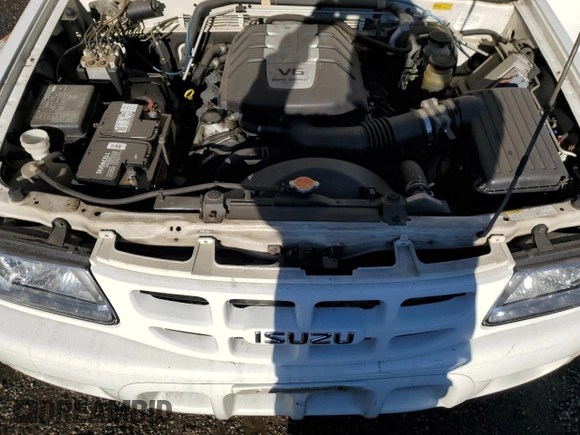 2001 Isuzu Rodeo S with VIN 4S2CK58W414338481, listed as a Copart auction lot 80849314 with 109,036 mi miles and Salvage Title. Bid and sale history available at DreamBid. Image 12.