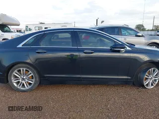 2014 Lincoln MKZ with VIN 3LN6L2G90ER801385, listed as a IAAI auction lot 41815173 with 155,579 mi miles and . Bid and sale history available at DreamBid. Image 12.