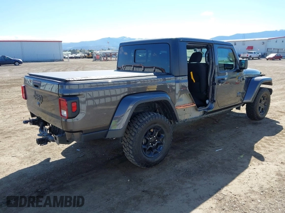 2023 Jeep Gladiator Sport S z VIN 1C6HJTAG2PL575276, wystawiony jako IAAI lot #42056473 z przebiegiem 17 043 mil mil oraz . Historia ofert i sprzedaży dostępna na DreamBid. Obrazek 4.