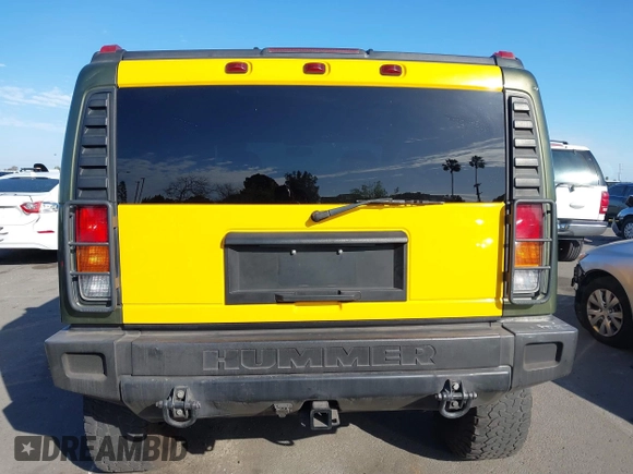 2003 Hummer H2 z VIN 5GRGN23UX3H124727, wystawiony jako IAAI lot #41697787 z przebiegiem 241 554 mil mil oraz . Historia ofert i sprzedaży dostępna na DreamBid. Obrazek 16.