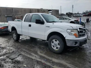 2014 Ford F-150 XL with VIN 1FTEX1EMXEFC40664, listed as a Copart auction lot 43030155 with 144,720 mi miles and Salvage Title. Bid and sale history available at carsss.com. Image 4.