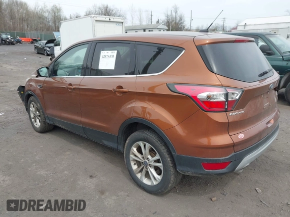 2017 Ford Escape SE with VIN 1FMCU9GD5HUA57132, listed as a IAAI auction lot 42075470 with 106,271 mi miles. Bid and sale history available at carsss.com. Image 3.