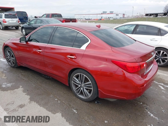 2014 Infiniti Q50 Premium with VIN JN1BV7AR5EM704052, listed as a IAAI auction lot 41155726 with 100,830 mi miles. Bid and sale history available at carsss.com. Image 3.