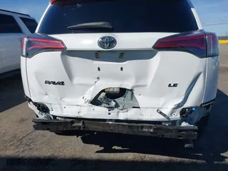 2018 Toyota RAV4 LE with VIN 2T3ZFREV8JW467744, listed as a IAAI auction lot 41818614 with 95,609 mi miles. Bid and sale history available at carsss.com. Image 6.