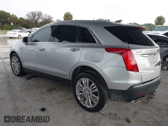 2018 Cadillac XT5 Premium Luxury FWD z VIN 1GYKNERS7JZ214504, wystawiony jako IAAI lot #40067507 z przebiegiem Nie podano mil oraz . Historia ofert i sprzedaży dostępna na DreamBid. Obrazek 3.