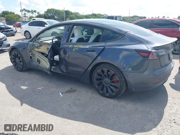 2022 Tesla Model 3 Performance with VIN 5YJ3E1EC9NF201184, listed as a IAAI auction lot 41534959 with 29,389 mi miles and . Bid and sale history available at DreamBid. Image 3.