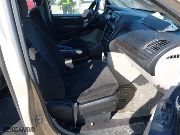 2013 Dodge Grand Caravan SXT with VIN 2C4RDGBG9DR680782, listed as a IAAI auction lot 41776855 with 125,663 mi miles. Bid and sale history available at carsss.com. Image 5.