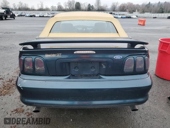 1994 Ford Mustang z VIN 1FALP45T3RF143074, wystawiony jako Copart lot #51442685 z przebiegiem 144 966 mil mil oraz Szkoda całkowita • Salvage title. Historia ofert i sprzedaży dostępna na DreamBid. Obrazek 6.