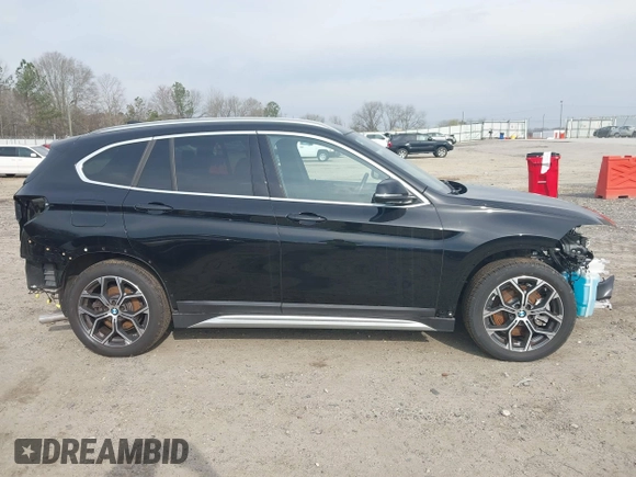 2021 BMW X1 xDrive28i with VIN WBXJG9C05M5T83784, listed as a IAAI auction lot 41696073 with 15,865 mi miles and . Bid and sale history available at DreamBid. Image 14.