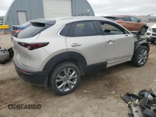 2023 Mazda CX-30 S Carbon Edition z VIN 3MVDMBCM2PM522361, wystawiony jako Copart lot #54751885 z przebiegiem 48 398 mil mil oraz Szkoda całkowita • Salvage title. Historia ofert i sprzedaży dostępna na DreamBid. Obrazek 3.