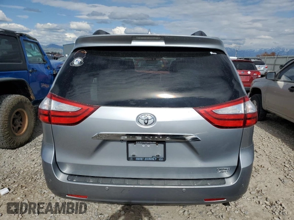 2015 Toyota Sienna Limited z VIN 5TDDK3DC5FS127754, wystawiony jako Copart lot #57437715 z przebiegiem 99 496 mil mil oraz Szkoda całkowita • Salvage title. Historia ofert i sprzedaży dostępna na DreamBid. Obrazek 6.