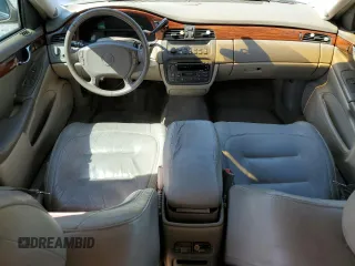 2003 Cadillac DeVille z VIN 1G6KD54Y63U250482, wystawiony jako Copart lot #52164515 z przebiegiem 131 376 mil mil oraz Szkoda całkowita • Salvage title. Historia ofert i sprzedaży dostępna na DreamBid. Obrazek 8.
