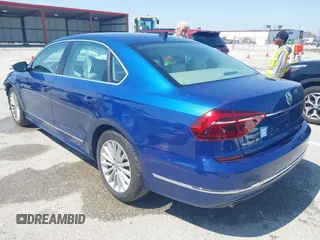 2017 Volkswagen Passat 1.8T SE with VIN 1VWBT7A31HC021299, listed as a IAAI auction lot 41961686 with 135,912 mi miles. Bid and sale history available at carsss.com. Image 3.