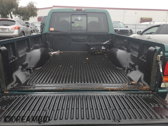1999 Mazda B-Series 2WD Truck SE with VIN 4F4YR16V4XTM02282, listed as a Copart auction lot 85363034 with 102,923 mi miles and Clean Title. Bid and sale history available at carsss.com. Image 10.