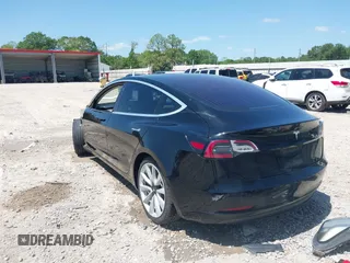 2018 Tesla Model 3 Long Range Battery with VIN 5YJ3E1EAXJF019907, listed as a IAAI auction lot 41995969 with Not Provided miles and . Bid and sale history available at DreamBid. Image 3.