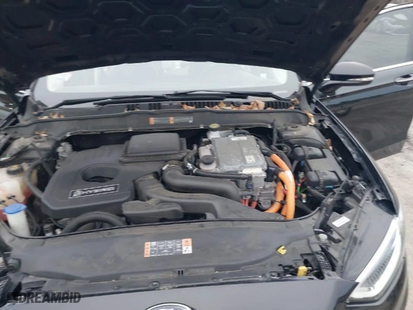 2020 Ford Fusion Hybrid Titanium with VIN 3FA6P0RU7LR141332, listed as a IAAI auction lot 40994365 with 106,592 mi miles. Bid and sale history available at carsss.com. Image 10.