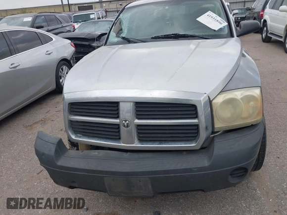 2005 Dodge Dakota ST z VIN 1D7HE28K75S308645, wystawiony jako IAAI lot #41931890 z przebiegiem 338 615 mil mil oraz . Historia ofert i sprzedaży dostępna na DreamBid. Obrazek 12.
