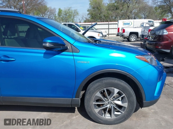 2016 Toyota RAV4 Hybrid XLE with VIN JTMRJREV5GD014170, listed as a IAAI auction lot 41822178 with 89,676 mi miles. Bid and sale history available at carsss.com. Image 18.