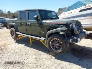 2022 Jeep Gladiator High Altitude with VIN 1C6HJTFG5NL179574, listed as a IAAI auction lot 41685973 with 38,451 mi miles and . Bid and sale history available at DreamBid. Image 1.