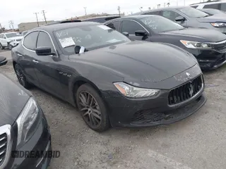 2018 Maserati Ghibli with VIN ZAM57XSA4J1268718, listed as a IAAI auction lot 41797273 with 51,936 mi miles. Bid and sale history available at carsss.com. Image 1.