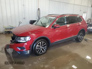 2021 Volkswagen Tiguan SE with VIN 3VV2B7AX2MM103853, listed as a Copart auction lot 88457785 with 65,890 mi miles and Salvage Title. Bid and sale history available at DreamBid. Image 1.