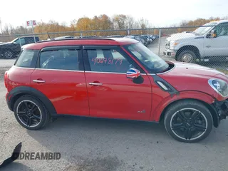 2015 MINI Cooper Countryman S with VIN WMWZC5C51FWP49282, listed as a IAAI auction lot 40698179 with 63,037 mi miles. Bid and sale history available at carsss.com. Image 14.