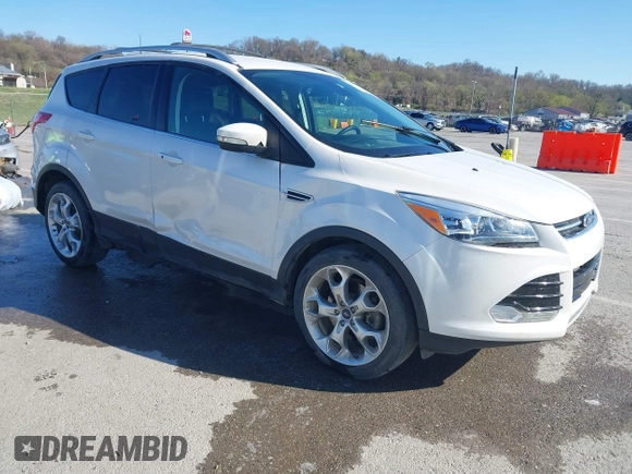 2013 Ford Escape Titanium with VIN 1FMCU0J96DUA71857, listed as a IAAI auction lot 41877003 with 118,864 mi miles and . Bid and sale history available at carsss.com. Image 1.