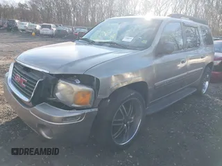 2003 GMC Envoy SLT z VIN 1GKET16S536201569, wystawiony jako IAAI lot #41109902 z przebiegiem Nie podano mil oraz . Historia ofert i sprzedaży dostępna na DreamBid. Obrazek 2.