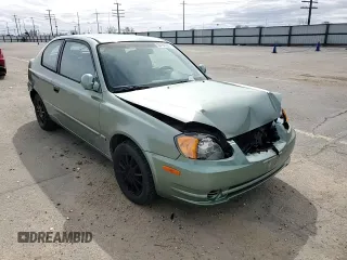 2003 Hyundai Accent GL with VIN KMHCG35C13U270585, listed as a Copart auction lot 50197935 with 53,822 mi miles and Salvage Title. Bid and sale history available at carsss.com. Image 11.