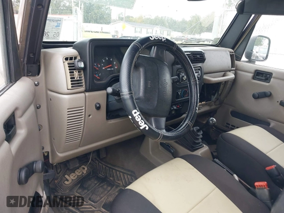 2003 Jeep Wrangler SE with VIN 1J4FA29113P304250, listed as a IAAI auction lot 40917099 with 191,589 mi miles. Bid and sale history available at carsss.com. Image 5.