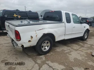 2002 Ford F-150 XL with VIN 1FTRX17L52KC49698, listed as a Copart auction lot 54307145 with 254,394 mi miles and Salvage title. Bid and sale history available at DreamBid. Image 3.