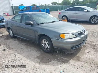 2004 Pontiac Grand Am SE1 z VIN 1G2NF52E64C257019, wystawiony jako IAAI lot #42248217 z przebiegiem 164 581 mil mil oraz . Historia ofert i sprzedaży dostępna na DreamBid. Obrazek 1.