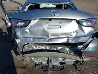 2016 Scion iA with VIN 3MYDLBZV5GY129856, listed as a IAAI auction lot 41624817 with 69,686 mi miles. Bid and sale history available at carsss.com. Image 6.