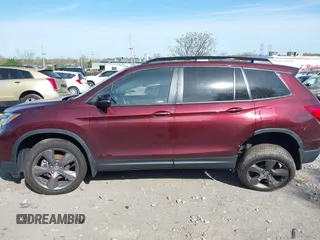 2021 Honda Passport Touring z VIN 5FNYF8H91MB022986, wystawiony jako IAAI lot #42077321 z przebiegiem 20 497 mil mil oraz . Historia ofert i sprzedaży dostępna na DreamBid. Obrazek 14.