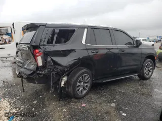 2021 Chevrolet Tahoe LS with VIN 1GNSCMKD4MR335973, listed as a Copart auction lot 69972594 with 42,129 mi miles and Salvage Title. Bid and sale history available at carsss.com. Image 3.